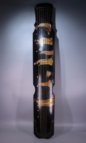 A Qing Dynasty lacquered gilded painted guqin
