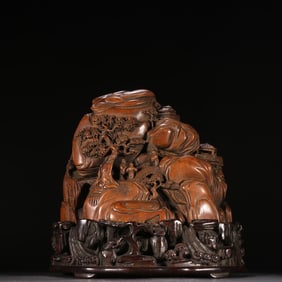 A Qing Dynasty sandalwood character story mountain ornament