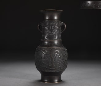 A Qing Dynasty precision cast copper tire animal face pattern incense bottle