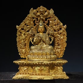 A Qing Dynasty Tibetan Tantric copper gilt split backlit Tsongkhapa Buddha statue