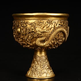 A Qing Dynasty copper-gilt high-relief dragon pattern goblet