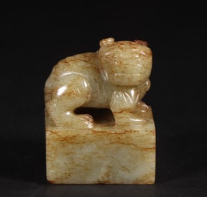 A Qing Dynasty Hetian jade auspicious beast button seal