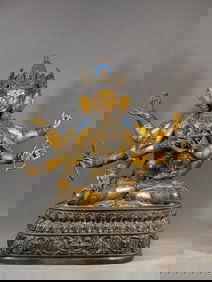 A Qing Dynasty copper gilt eight-armed Tara