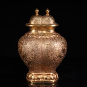 A Tang Dynasty copper-gilt double phoenix pattern double-lid jar
