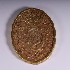 A Qing Dynasty gilded dragon pattern plaque