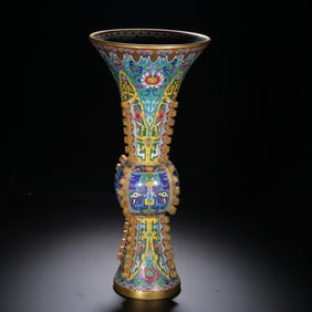 A Qing Dynasty cloisonné enamel animal face pattern flower cup