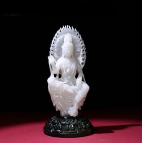 A Han Dynasty white jade jasper base Guanyin ornament