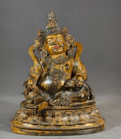 A Qing Dynasty copper god of wealth