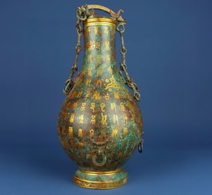 A Han Dynasty bronze inscription chain bottle