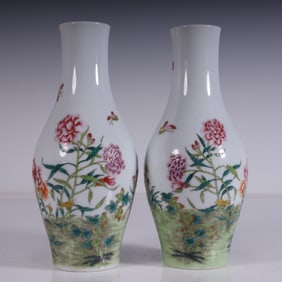 A pair of Qing Dynasty pastel flower vases
