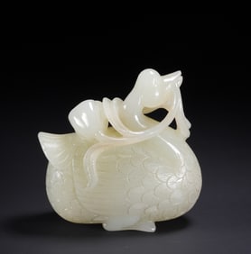 A piece of Hetian jade treasure duck with lotus