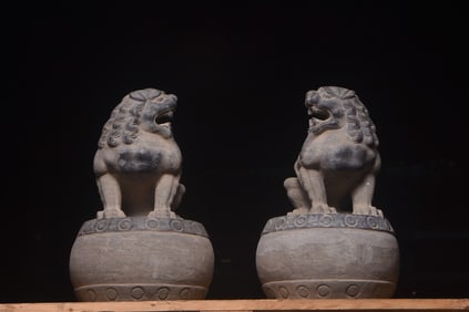 A lion on a stone carved drum in the Qing Dynasty