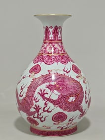 A Qing Dynasty Yongzheng year enamel carmine red double dragon play bead pattern jade pot spring