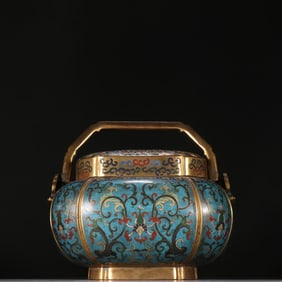 A Qing Dynasty copper-gilt cloisonné hand warmer