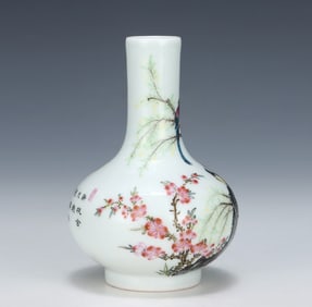 A Qing Dynasty Yongzheng enamel colorful apricot forest spring swallow sky ball vase