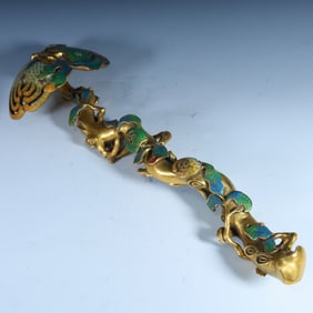 A Qing Dynasty Qianlong cloisonné gilt ruyi (Buddha's hand shape symbolizes three blessings)