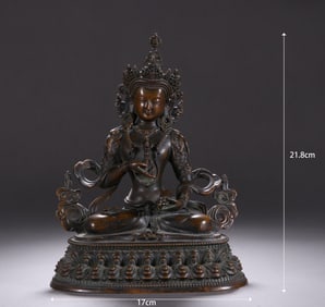 A bronze seated statue of a Bodhisattva