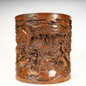 A Qing Dynasty boxwood carved landscape character pattern pen holder