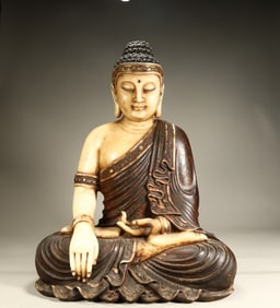 A piece of white jade Shakyamuni Buddha in the Qing Dynasty