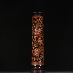 A Qing Dynasty sandalwood entwined pattern incense tube