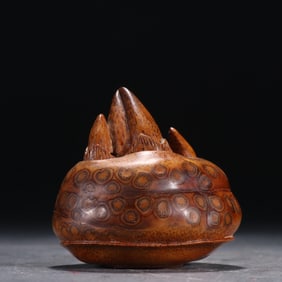 A late Qing Dynasty bamboo carved water chestnut ornament