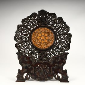 A Qing Dynasty mahogany inlaid boxwood carved flower pattern seat screen