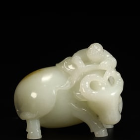 A Qing Dynasty Hetian jade boy riding a cow