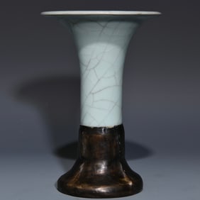 An official porcelain wrapped tin flower cup