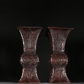 A pair of Qing Dynasty agarwood dragon pattern flower cups