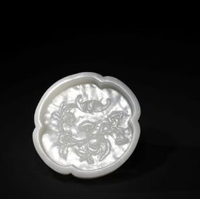 A Qing Dynasty white jade begonia-shaped pen wash stationery