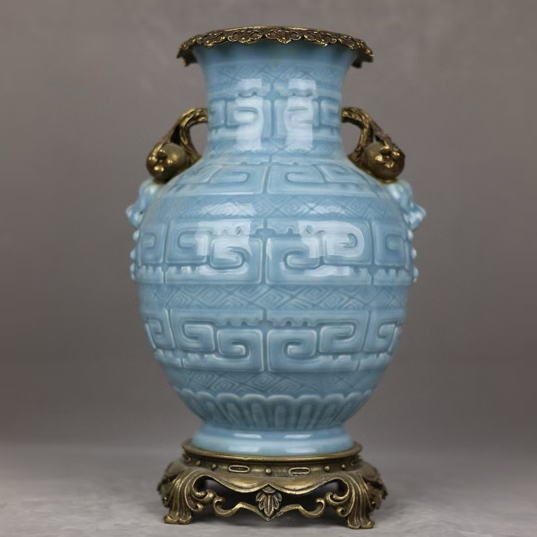 A azure glaze copper-inlaid pomegranate amphora lion head: Sky blue glazed copper pomegranate amphora lion head SIZE: H:34cm mouthD:14cm D:21cm bottomD:16cm (The Dimensions Of All Batches Are Manually Measured.If You Need More Detailed Information, Please Con