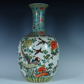 A Qing Dynasty Kangxi pastel flower vase