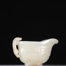 A Qing Dynasty Hetian jade beast face pattern dragon ear cup