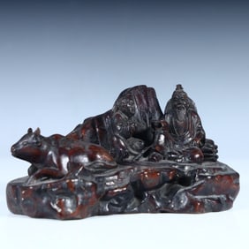 A Qing Dynasty agarwood carved figure ornament