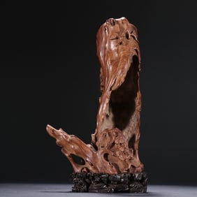 A Qing Dynasty Huanghuali carved pine plum ornament