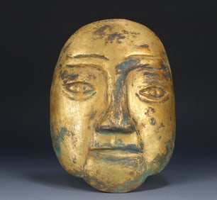 A copper gilt mask of the Liao Dynasty