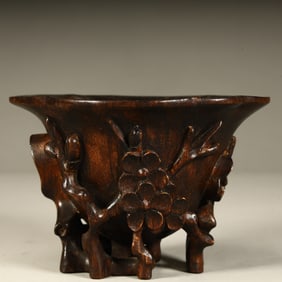 A piece of Qing Dynasty agarwood carved plum pattern antique cup weight