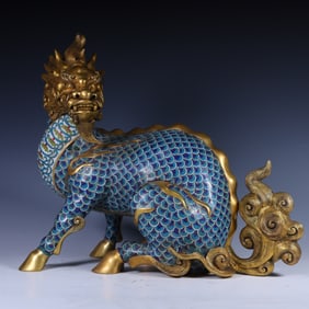 A Qing Dynasty copper-gilt cloisonné unicorn beast