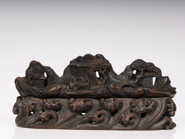 A piece of agarwood carved mountain pen holder