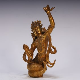 A piece of copper gilt protector