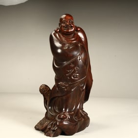 A Qing Dynasty fine mahogany figure ornament