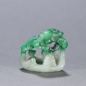 A carving of a jade pine tree