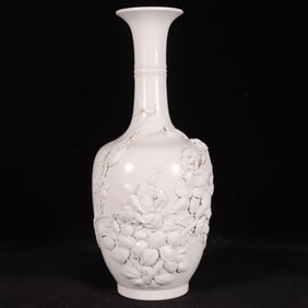 A Qing Dynasty Daoguang pile carved bird lotus seed bottle
