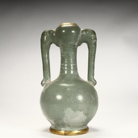 A Song Dynasty celadon glazed open-piece elephant ear gilt vase