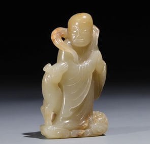 A Qing Dynasty green jade Arhat reindeer pendant Zen ornament