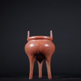 A Song Dynasty firewood kiln red glaze three-legged cauldron furnace