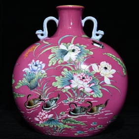 A Qing Dynasty Qianlong carmine ground enamel colored flower and bird pattern amphora flat bottle