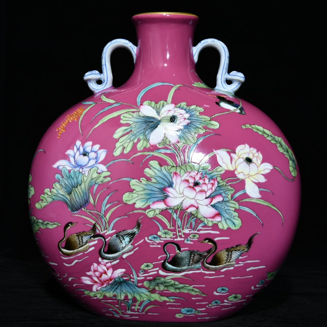 A Qing Dynasty Qianlong carmine ground enamel colored flower and bird pattern amphora flat bottle: Qing Dynasty Qianlong carmine red enamel colorful flower and bird pattern amphora flat bottle SIZE: H:27.5cm D:24cm (The Dimensions Of All Batches Are Manually Measured.If You Need More Detailed Infor