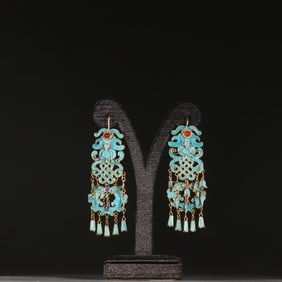 A pair of silver gilt emerald earrings in the Qing Dynasty