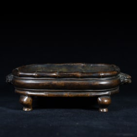 A Qing Dynasty copper bamboo incense burner